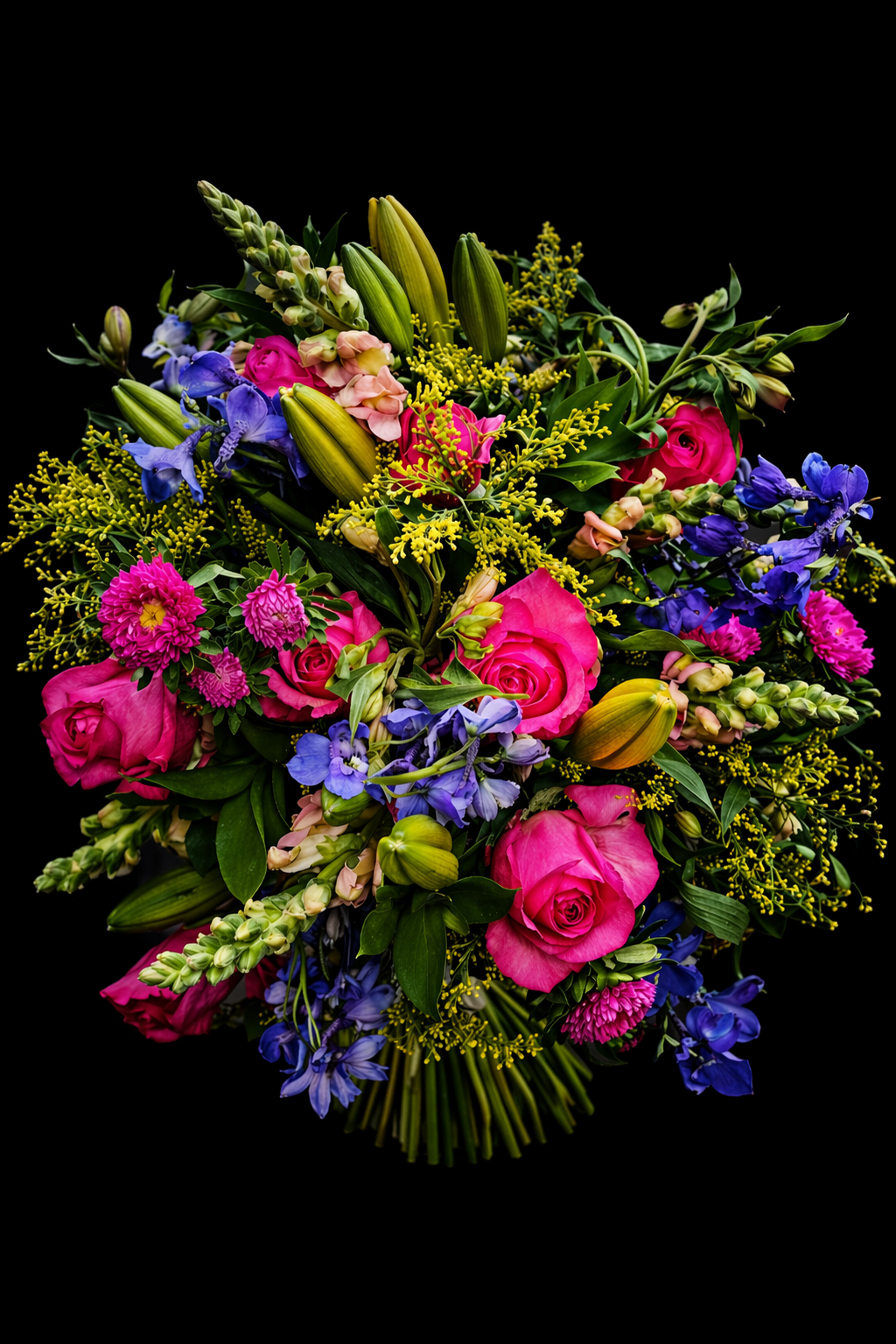 Colorful bouquet of blue delphiniums, pink roses, orange lilies, yellow solidaster, pink snapdragons, yellow alstromeria and greenery on a black background